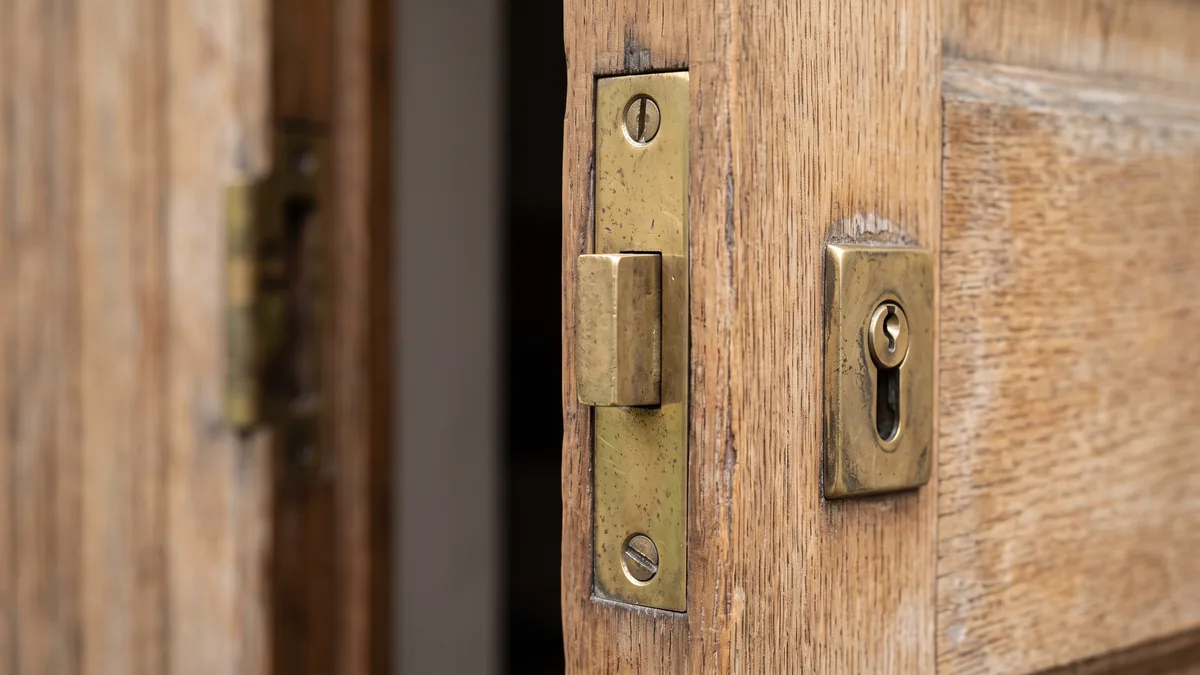 Brass mortice deadlock fitted to a wooden door
